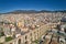 Aerial view the city of Kavala in northern Greek, ancient aqueduct Kamares, homes and medieval city wall