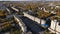 Aerial view of the City, Main Street, Park, Building, Alley, Mountains in Sunset, Autumn