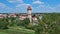 Aerial view on city, old town, water pressure tower, green city.