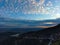 Aerial view of the city at sunset with amazing cloud covers