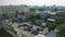 Aerial view of a city yard with graffiti on the walls of an old garage and other buildings and parked cars. Stock