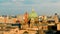 Aerial view of cityscape Berlin surrounded by buildings under blue bright sky