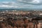 Aerial view of a cityscape of Edinburgh, Scotland on a cloudy day