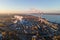 Aerial view of cityscape with industrial enterprises and emission of harmful smoke from the chimneys