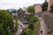 Aerial view of cityscape Luxembourg surrounded by buildings with people walking