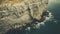 Aerial View Of Cliffs: Retro Filters, Naturalistic Textures, And Classical Landscapes