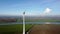 Aerial view close-up of a non-rotating wind turbine in a Dutch landscape.