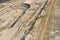 Aerial view of coal mining with bucket wheel excavator. Top view of a quarry. Heavy mining industry