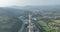 Aerial view of coal power plant high pipes with black smoke moving up polluting atmosphere at sunset