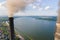 Aerial view of coal power plant high pipes with black smokestack polluting atmosphere. Electricity production with