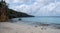 Aerial view of coast of Curacao in the Caribbean Sea with turquoise water, white sandy beach and beautiful coral reef at