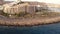 aerial view of the coast of Gran Canaria, resorts, hotels and holiday houses on the beach. Arguineguin