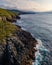 Aerial view of the coast with large cliffs at sunset. Cantabria,