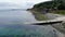 Aerial view on coast in Whitehead, Northern Ireland. Drone photo of town and water of Irish Sea