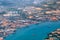 Aerial view of coastal construction or port areas in Strait of Malacca, on airplane route to Malaysia or Singapore