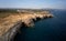 Aerial view on coastal rocks with natural sea caves near Spilies beach on Crete, Greece