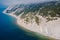 Aerial view of coastline with blue sea and highest cliff. Summer day at Black sea