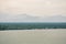 Aerial view of the coastline of mangrove forest and river landscape. Seascape view with sea, palm tree and fishing village. Island