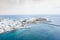Aerial view of the coastline and port of Tinos island in Greece