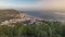 Aerial view of the coastline of the village of Sesimbra timelapse. Portugal