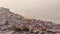 Aerial view of the coastline of the village of Sesimbra timelapse. Portugal