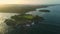 Aerial view of coastline with warm sunset tones in touristic area Nusa Dua, Bali