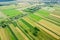 Aerial view of colorful countryside patchwork in diminishing perspective. rural summer landscape