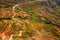 Aerial view of colorful field terraces and the road