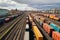 Aerial view Colorful freight trains on station, bustling industrial landscape