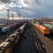 Aerial view Colorful freight trains on station, bustling industrial landscape