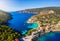 Aerial view of the colorful and idyllic fishing village of Assos on Kefalonia island, Greece,