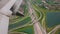 Aerial view of colorful Miami landscape under aircraft wing.