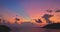 aerial view colorful pink Light through the clouds above the island.