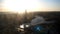 Aerial view of the colorful sunset over the Yekaterinburg, Russia. Shot. Embankment of the central pond and the historic