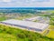 Aerial view of colorful trucks in the terminal waiting for unloading. Top view of the logistics center. Transportation. Freight