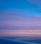 Aerial view of Comporta Troia bay from the plane, beautiful purple sunset