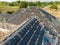 Aerial view of Concrete or CPAC cement roof tiles on the new roof structure. under construction residential building.