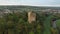 Aerial view of Conna Castle in county Cork, Ireland, a ruined five storey square tower house about 85 feet tall built in 1550