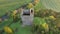 Aerial view of Conna Castle in county Cork, Ireland, a ruined five storey square tower house about 85 feet tall built in 1550