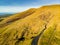 Aerial view of Conor Pass, one of the highest Irish mountain passes served by an asphalted road, located on the Dingle Peninsula,