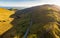 Aerial view of Conor Pass, one of the highest Irish mountain passes served by an asphalted road, located on the Dingle Peninsula,