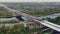 Aerial view of the construction of the highway , consisting of bridges, overpasses crossing canals, swamps, railway and road