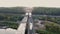 Aerial view of the construction of the highway, consisting of bridges, overpasses crossing canals, swamps, railway and road