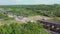 Aerial view of the construction of the highway , consisting of bridges, overpasses crossing canals, swamps, railway and road