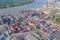 Aerial view of container cargo ship in the export and import business and logistics international goods in urban city. Shipping to