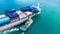 Aerial view container ship carrying container for import and export, business logistic and transportation by ship in open sea