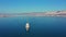 Aerial view of container ship floating with cargo from commercial sea port