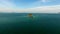 Aerial view, copter flies around the rock in the Indian ocean, near Phuket, thailand