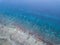 Aerial View of Coral Reef and Small Boats in Caribbean