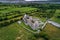 Aerial view of Corcomroe Abbey ruins and its cemetery